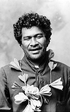 Young Hawaiian man with a floral lei